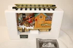 The Holiday Express Animated Train Set Log Mill Wood Car No 380-4 Nib. Fixed Price $79.00.