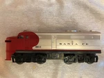 Lionel Santa Fe Locomotive, 2 Passenger Cars, 3 Freight. Fixed Price $300.00.
