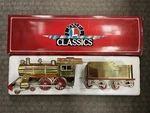 + Lionel Classics 6-13104 The No. 7 Gold Steam Locomotive & Tender W/ Box. Fixed Price $1299.99.