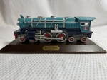 Avon Lionel Blue Comet 400E Decorative Train Locomotive Model With Display Base. Fixed Price $10.00.