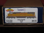 Athearn Genesis Ho Scale Tsunami 2 Union Pacific SD70M 4454. Fixed Price $239.95.