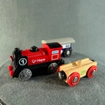 Hape Wooden Railway Battery Powered Engine Train And Cargo Tender. Fixed Price $12.00.