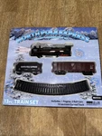 North Pole Express Battery Operated 13 Piece Train Set New. Fixed Price $10.90.