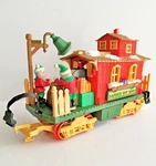 New Bright Holiday Express Santa's Toy Shop Elves Animated Train Car Scale. Fixed Price $24.95.