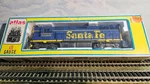 Atlas # 7021 Santa Fe GP-38 Powered Locomotive 3560 Lnib. Fixed Price $38.95.