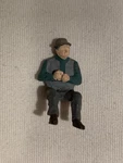 Arttista Man W/ Hat Sitting Seated - Scale Figure Train People. Fixed Price $9.99.