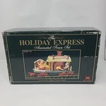 The Holiday Express Animated Train Bakery Car New Bright No. 380-3 Christmas. Fixed Price $50.99.