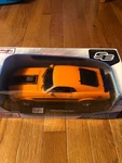 Maisto 1:18 Scale 1970 Ford Mustang Mach Twister Special 428 Orange Diecast. Fixed Price $33.99.