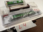 New Atlas Burlington Northern (bn) Locomotive Scale &2 Cars Lot 14. Fixed Price $165.00.