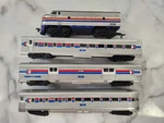 Ho Scale Train Amtrack Set Of 4 Engine And Passenger Cars. (life Like) Running. Fixed Price $70.00.