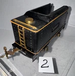 Lionel Prewar Gauge 257T Tin Black W/orange Strip Tender. Fixed Price $55.00.