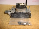 Lionel Postwar Trains Parts O/O27 Diesel Two Wheel Magnetraction Alco Motor #1. Fixed Price $35.00.