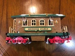 Lqqk New Bright Holiday Express 380 Steel Wheels Brown Animated Reindeer Stable. Fixed Price $399.99.