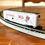 Model Power Scale Carnation Milk 25003 Boxcar #4029. Fixed Price $11.40.
