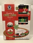 New Santas Choo Christmas Train Image Projecting Light Sound Steam 36". Fixed Price $60.00.