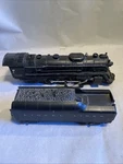 + Lionel Postwar Gauge 4-6-4 Steam Locomotive 2046W Whistle Tender. Fixed Price $155.00.