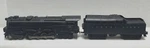 Lionel O-gauge Potwar Steam Turbine Locomotive & 2671WX Whistle Coal Tender. Fixed Price $229.99.