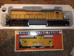Lionel Union Pacific DASH-8 40C Engine (6-18205) And Caboose (6-19706) Nib. Fixed Price $230.00.