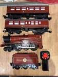 Lionel Harry Potter Hogwarts Castle 5972 Engine Train Set Tender Two Cars. Fixed Price $75.00.