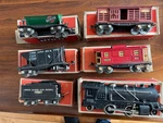 Lionel 261E Vintage Gauge Prewar Steam Locomotive Set, Wi/ Boxes 5 Cars Runs!. Fixed Price $324.99.