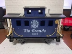 Scientific Toys Service Railway Express Train - Rio Grande 4067 Caboose. Fixed Price $15.00.