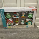 Infantino 8 Piece Holiday Village Go Gaga Collection Light Up House Nib. Fixed Price $19.99.