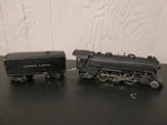 Lionel 1666 Locomotive W/1689 Car O-27 Gauge. Fixed Price $90.00.
