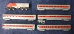 Trix Scale Santa Fe Diesel Locomotive And Passenger Cars. Fixed Price $69.99.