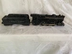 The Lionel Postwar 675 Steam Locomotive With 6466W Coal Whistle Tender. Fixed Price $150.00.