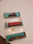 Atlas Scale Burlington Locomotive 2163 Union Pacific 2402 3309 Box Car. Fixed Price $40.00.