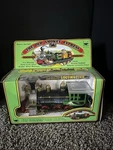 The Old Smokey Express Locomotive 1987 New Bright, In Distressed Box. Fixed Price $14.99.