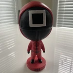 Squide Game Figure Villain Boss Triangle Round Square Doll Toy. Fixed Price $28.00.
